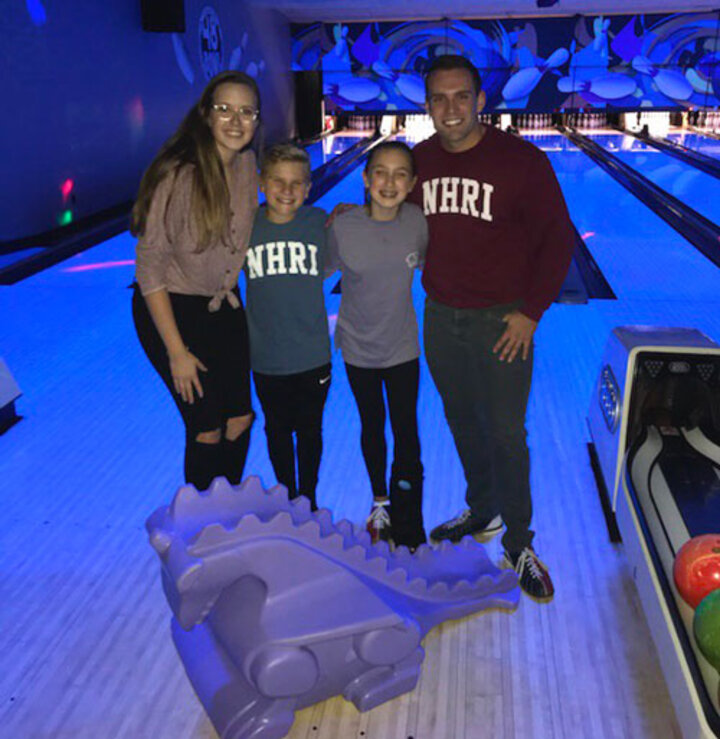 Picture of mentor and mentees at a bowling ally